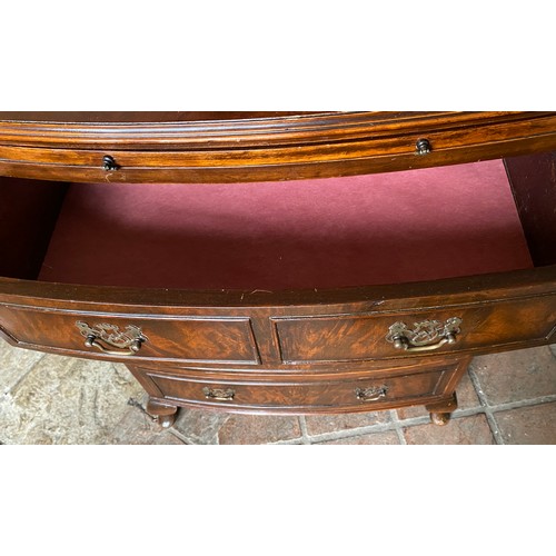 89 - A Victorian mahogany bow fronted chest of four drawers with brushing slide. 83 h x 63 w x 42cm d.