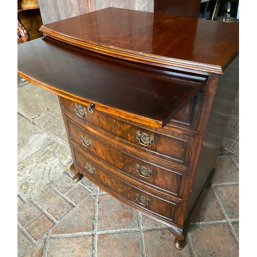 89 - A Victorian mahogany bow fronted chest of four drawers with brushing slide. 83 h x 63 w x 42cm d.