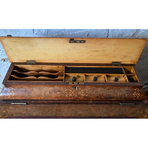 90 - A Victorian burr walnut and marquetry Davenport with fitted stationary box over a red leather slope ... 