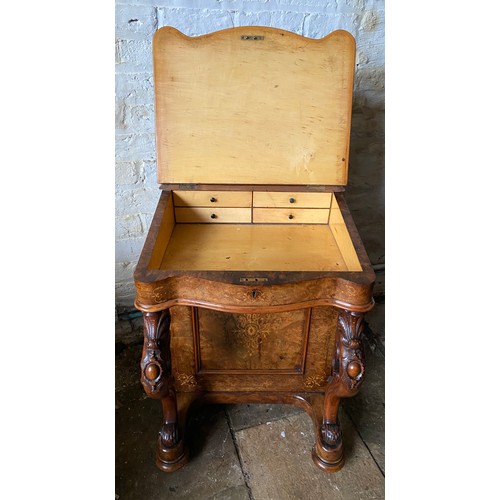 90 - A Victorian burr walnut and marquetry Davenport with fitted stationary box over a red leather slope ... 