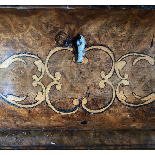 90 - A Victorian burr walnut and marquetry Davenport with fitted stationary box over a red leather slope ... 