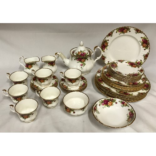 111 - Royal Albert Old Country Roses tea service and part dinner service. Tea service comprising teapot, 2... 