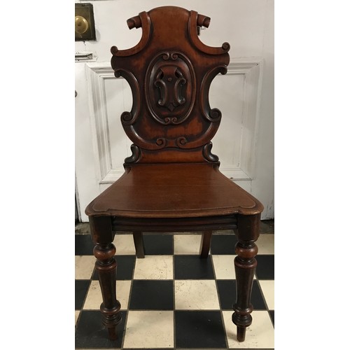 87 - A Victorian mahogany hall chair. Ht to back 90cm, ht to seat 43cm width at front 45cm.