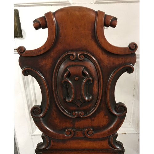 87 - A Victorian mahogany hall chair. Ht to back 90cm, ht to seat 43cm width at front 45cm.