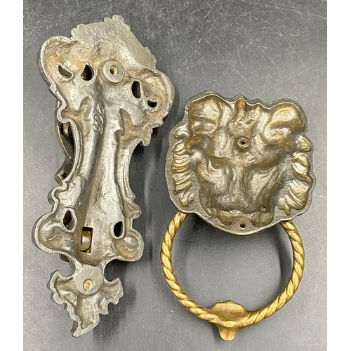 994 - An Art Nouveau cast iron door knocker  25cm l x 12cm w stamped 263 to back together with a cast iron... 