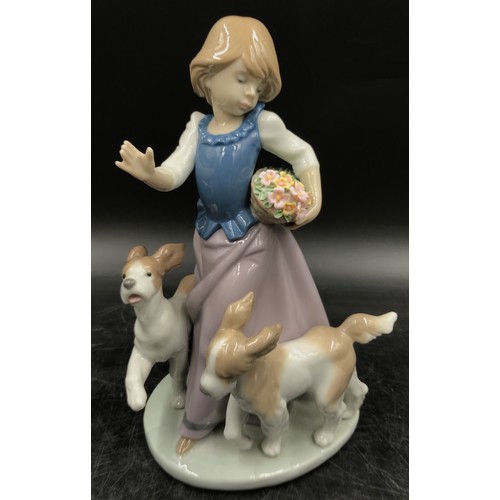 107 - A pair of Lladro figurines to include Out for a Romp 5761 and Mandolin Serenade 5696.