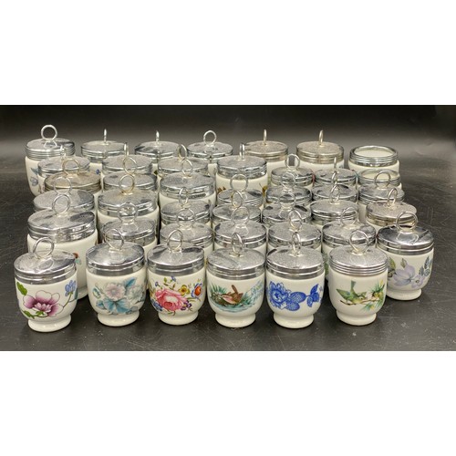 125 - Large quantity of Royal Worcester egg coddlers comprising 16, 10cm to top of handle, 23, 9cm to top ... 