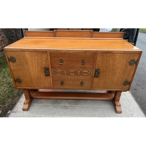 63 - An Art Deco Golden Oak sideboard, table and chairs by TT Cass & Sons, Hull. Sideboard 153 w x 52 d x... 