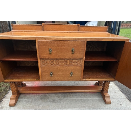 63 - An Art Deco Golden Oak sideboard, table and chairs by TT Cass & Sons, Hull. Sideboard 153 w x 52 d x... 