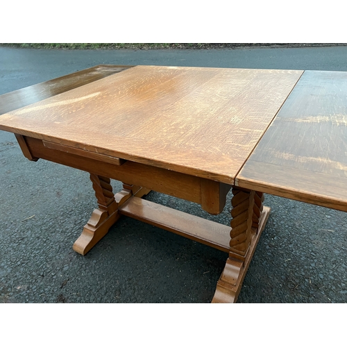 63 - An Art Deco Golden Oak sideboard, table and chairs by TT Cass & Sons, Hull. Sideboard 153 w x 52 d x... 