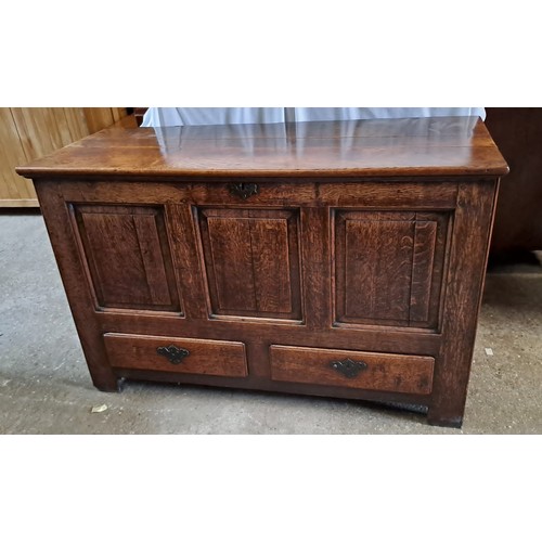 65 - An oak mule chest with two drawers to base. 80cm x 126cm x 53cm.