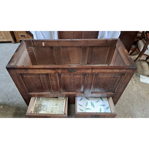 65 - An oak mule chest with two drawers to base. 80cm x 126cm x 53cm.