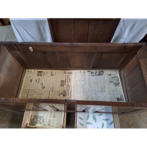 65 - An oak mule chest with two drawers to base. 80cm x 126cm x 53cm.