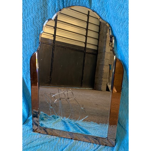 950 - A vintage mirror with rose gold glass  panels and ship design. 83 h x 56cm h l together with a squar... 