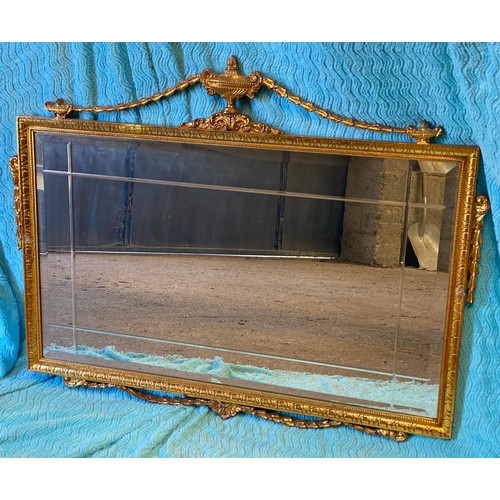 951 - A 20thC gilt framed mirror. 77 h x 97cm w.