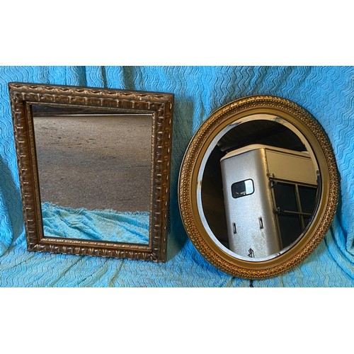 953 - Two gilt framed mirrors. Oval 60 x 51cm w. Oblong 60 x 47cm w.