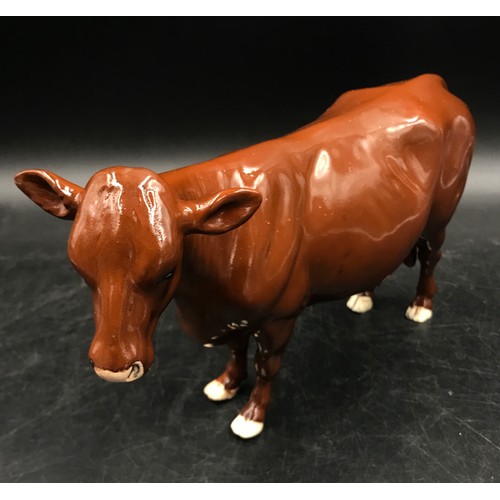 131 - Beswick Red Poll cow 16cm h, Beswick Hereford Calf 7.5cm h, and a Beswick Jersey Calf along with oth... 