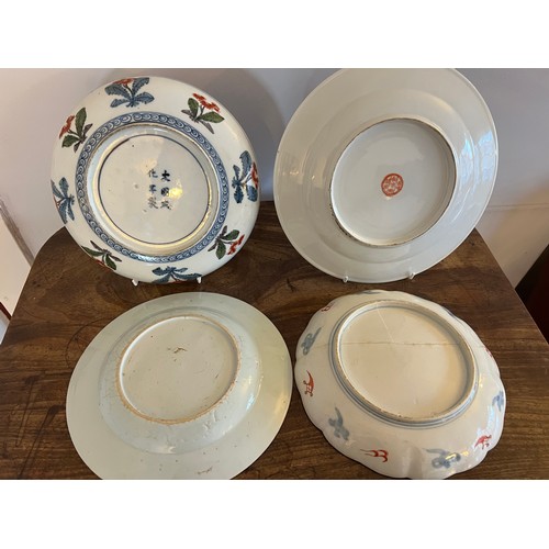 144 - Four oriental plates, 18thC and 19thC.