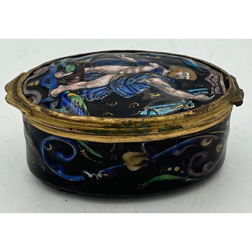 986 - Continental enamel and gilt metal patch box. 6 x 3.5cm.