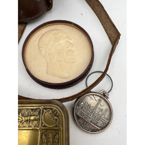 989 - A WWI brass Christmas tin 1914 13cm w, together with Hans Weiss binoculars in leather case,  Charles... 