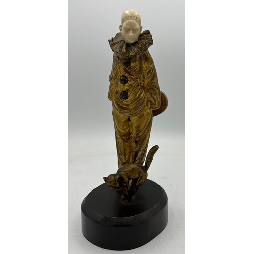 990 - A Georges Omerth French bronze and ivory figure, Pierrot with cat 23cm h. Signed to back. Ivory subm... 