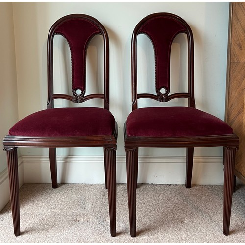 69 - A pair of fine quality French mahogany side chairs with rope decoration and ionic column front legs.