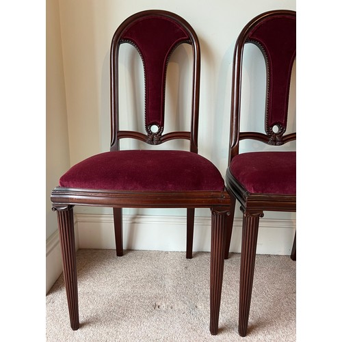 69 - A pair of fine quality French mahogany side chairs with rope decoration and ionic column front legs.