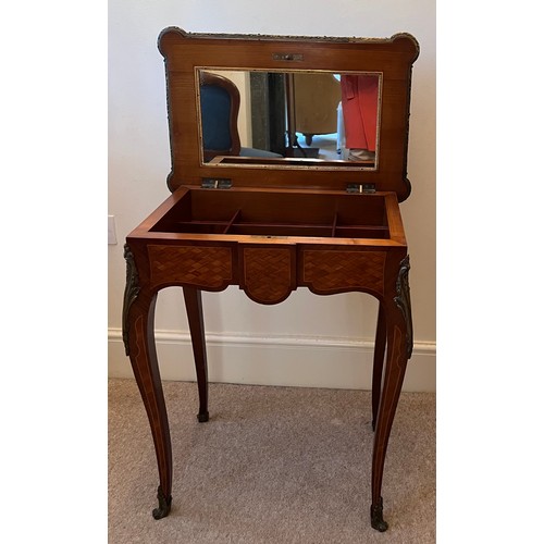 70 - A 19thC parquetry ladies dressing table with ormolu mounts made by and stamped Lamb of Manchester. 6... 