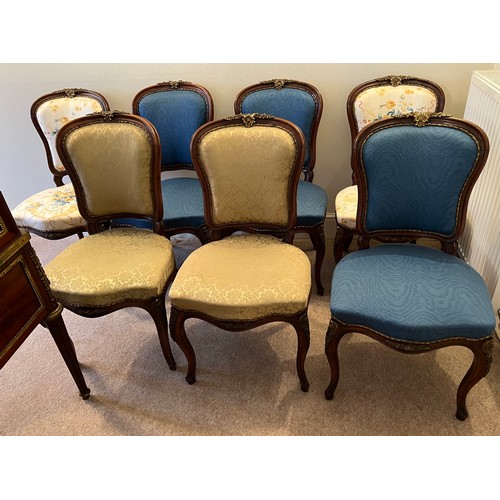 72 - Seven French mahogany and ormolu mounted cabriole legged salon chairs. Upholstered variously, togeth... 