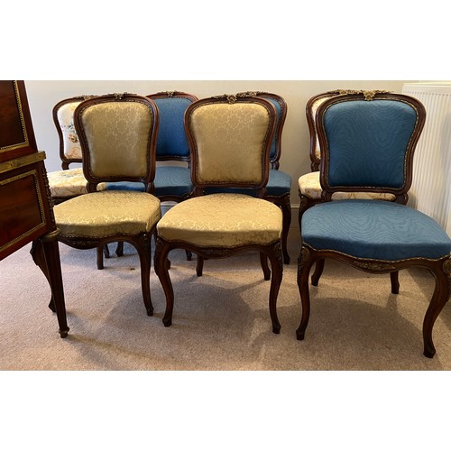 72 - Seven French mahogany and ormolu mounted cabriole legged salon chairs. Upholstered variously, togeth... 