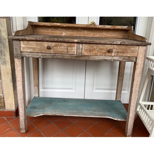 74 - Two drawer beech washstand with upstand and lower shelf.  105cm w x 48cm d x 99cm h.