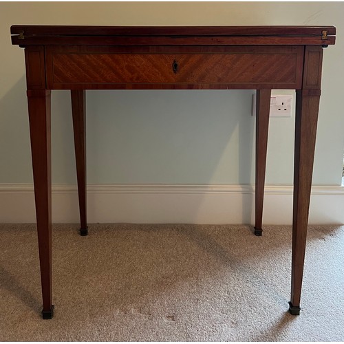 77 - A 19thC French metamorphic writing/card table in mahogany with parquetry top. 74cm w x 48cm d x 77cm... 