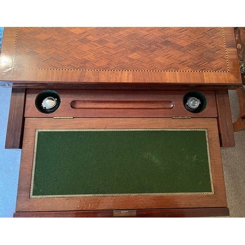 77 - A 19thC French metamorphic writing/card table in mahogany with parquetry top. 74cm w x 48cm d x 77cm... 