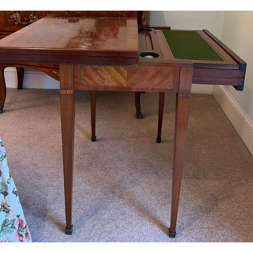 77 - A 19thC French metamorphic writing/card table in mahogany with parquetry top. 74cm w x 48cm d x 77cm... 