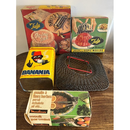 796 - Vintage kitchenalia to include Banania tin, Tala jelly moulds, Tala icing set, Moulinex moulin and a... 