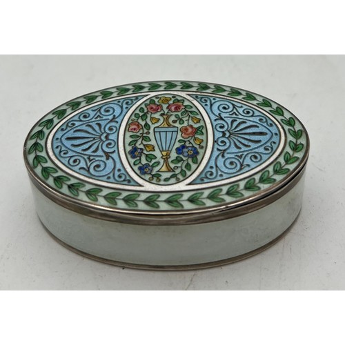 748 - A good quality continental silver and enamel oval box on a guilloche ground. Gilt interior. 5 x 7.5c... 