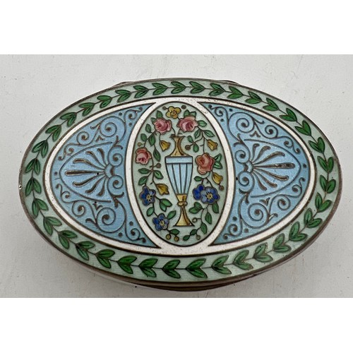 748 - A good quality continental silver and enamel oval box on a guilloche ground. Gilt interior. 5 x 7.5c... 