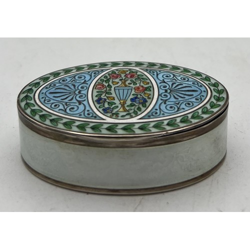 748 - A good quality continental silver and enamel oval box on a guilloche ground. Gilt interior. 5 x 7.5c... 