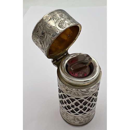 749 - Silver and ruby glass scent bottle with original glass stopper with fretting and engraved decoration... 