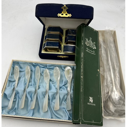 680 - Boxed set of lapis lazuli and white metal napkin rings, boxed WMF long cocktail spoons and 6 mother ... 