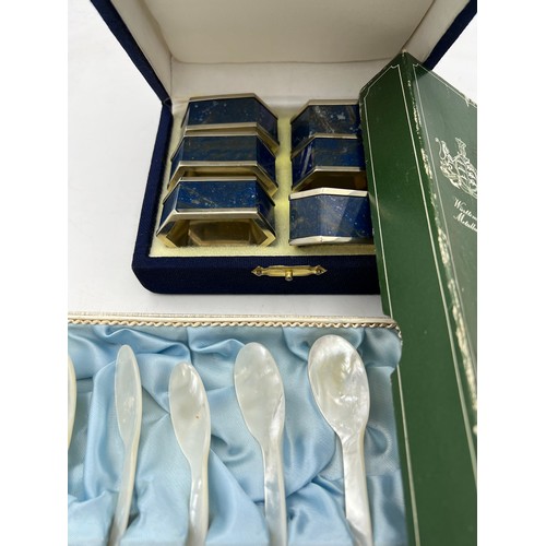 680 - Boxed set of lapis lazuli and white metal napkin rings, boxed WMF long cocktail spoons and 6 mother ... 