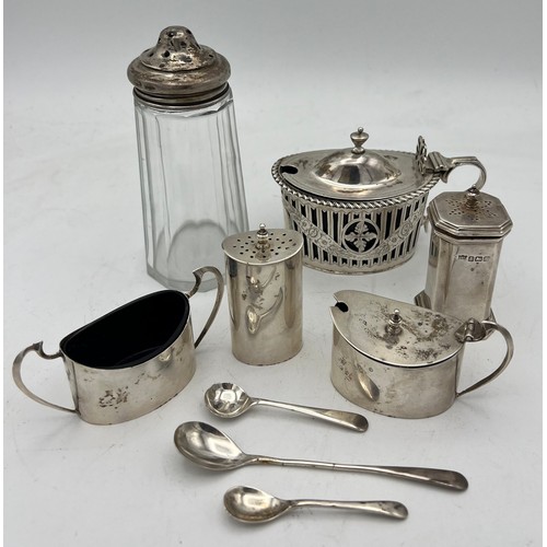 754 - Silver to include three piece cruet Birmingham 1947, maker Sanders and Mackenzie, mustard pot Cheste... 