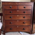 A 19thC mahogany 5 height chest of drawers on bracket feet.  135 h x 118 w x 49cm d.