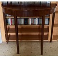A mahogany demi lune side table, square tapered legs with string inlay. 89 w x 35 d x 75cm h.
