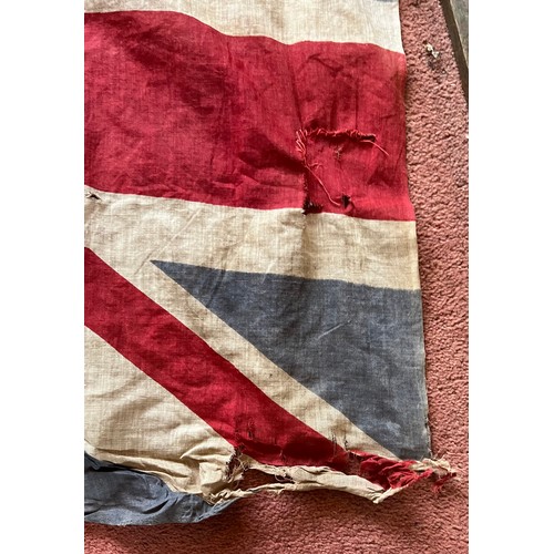 960 - A vintage Union Jack on wooden pole. 163cm high.