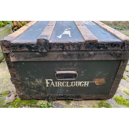 962 - An early 20thC wood and metal bound steamer trunk belonging to J.B.Fairclough, with carry handle to ... 