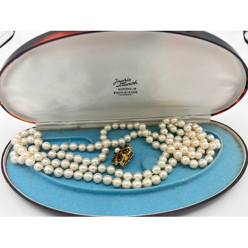 484 - A single strand cultured pearl necklace 114 cm l with 9 carat gold clasp 7.8gm set with pearls and r... 