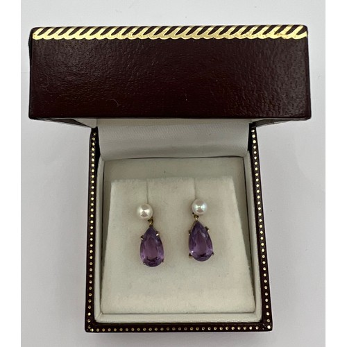 491 - Amethyst and cultured pearl earrings set in 9 carat gold.