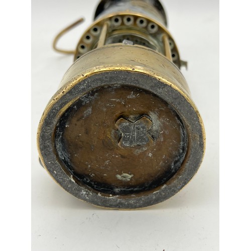 963 - An Eccles brass and steel Protector Lamp & Lighting Co Ltd Mining Lamp. Type 6, stamped 632. 23cm h.