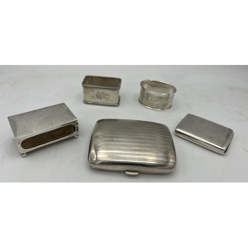 766 - Silver to include machine turned cigarette case, Birmingham 1918, Cohen & Charles, Matchbox holder, ... 